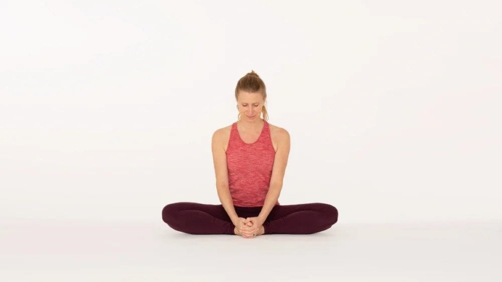 Premium Photo | Pregnant woman doing yoga postures on a mat. bound angle  pose sukhasana