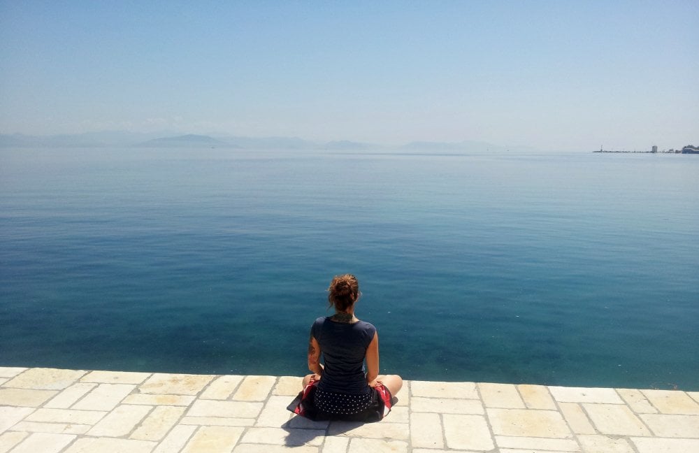 woman looking out to ocean