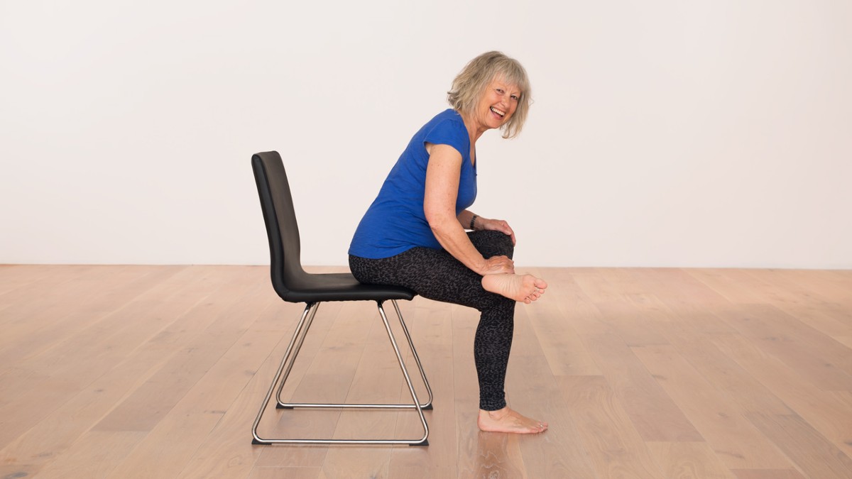 Seniors Stand Tall In Mountain Pose During Yoga