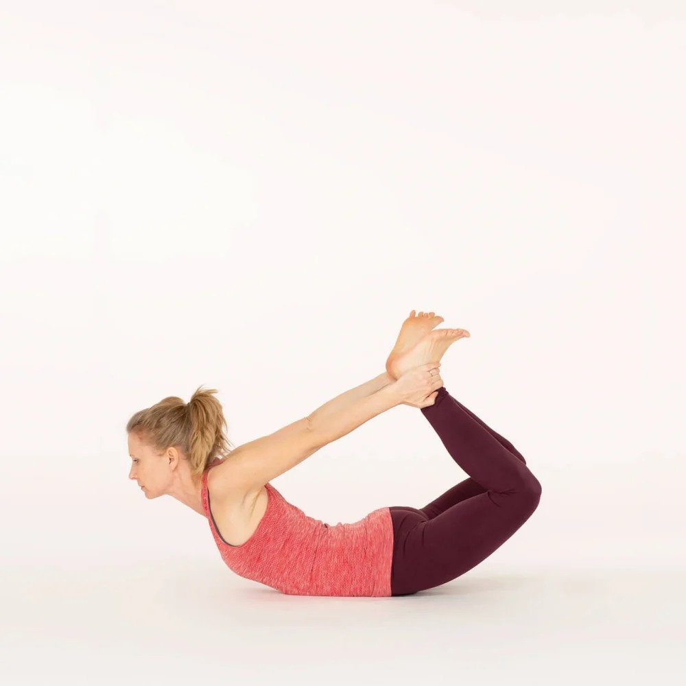 The Holistic Benefits of Bow Pose - DoYou