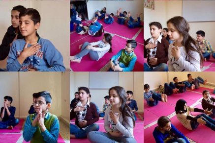 Syrian refugee children doing yoga and meditation