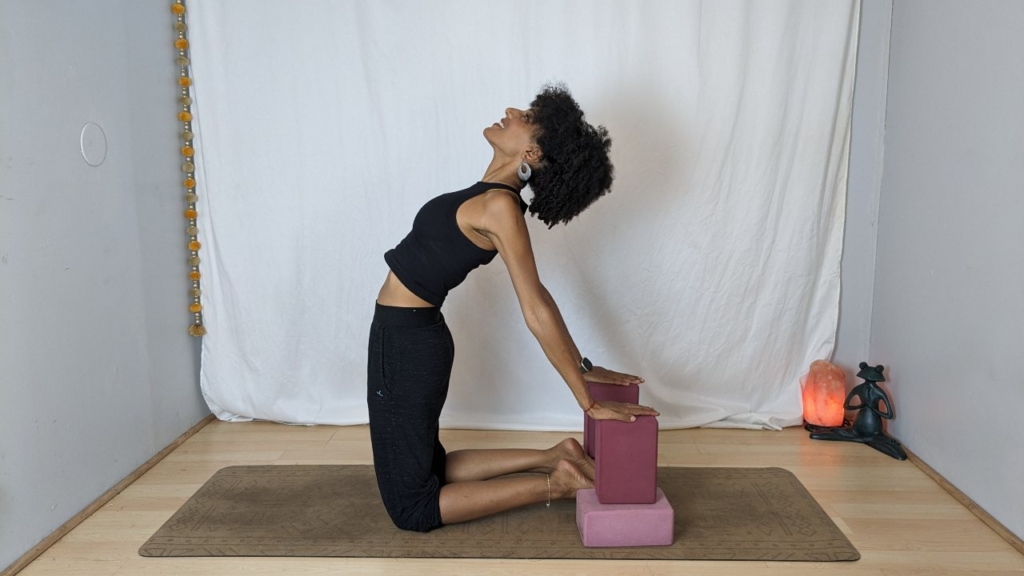 Camel pose with blocks under hands