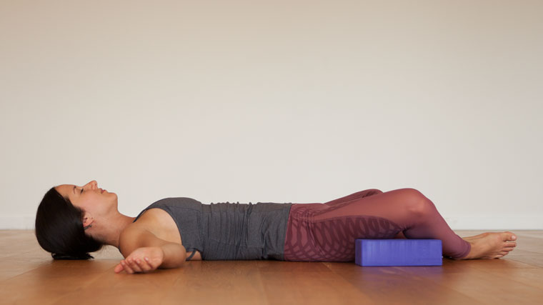 Supine Bound angle pose with blocks