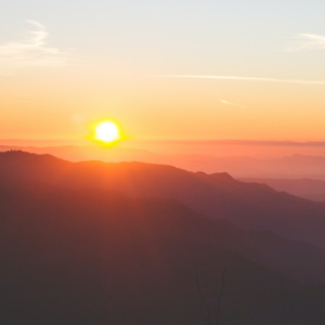 Sunset over a mountain for summer solstice