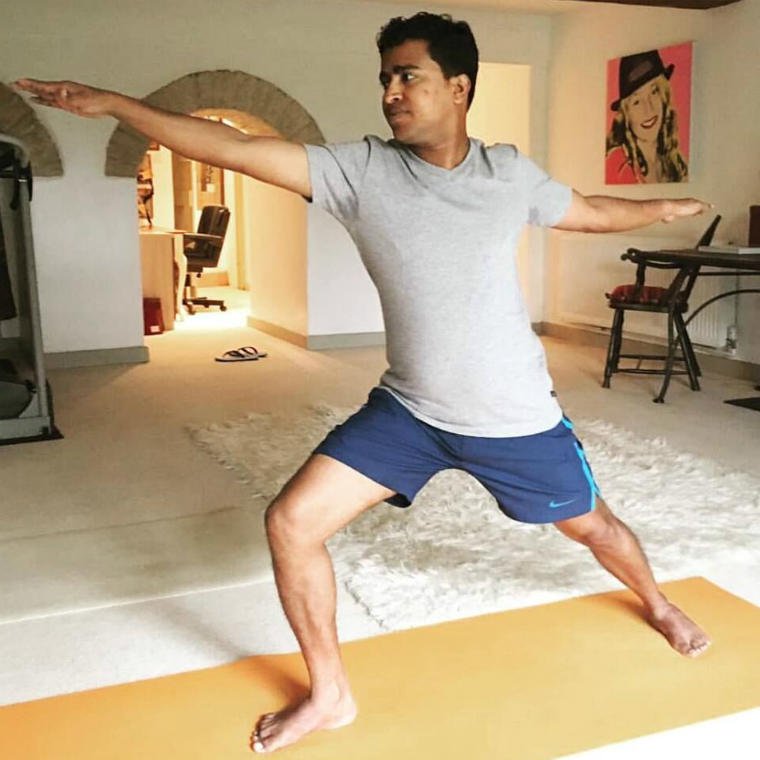 Ashok Shankar practising online yoga