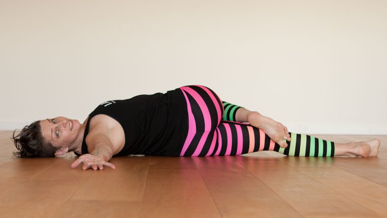 Reclining twist yoga pose