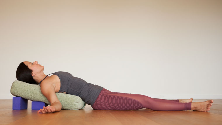 Supported heart opening pose 